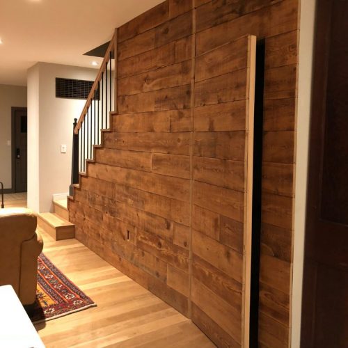 custom farmhouse wooden wall with secret hidden door